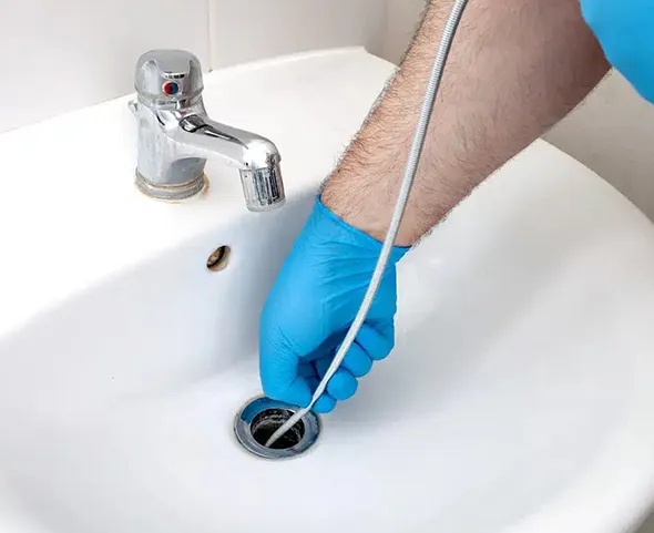 Root removal and hydro jetting services for clearing and cleaning clogged drains.